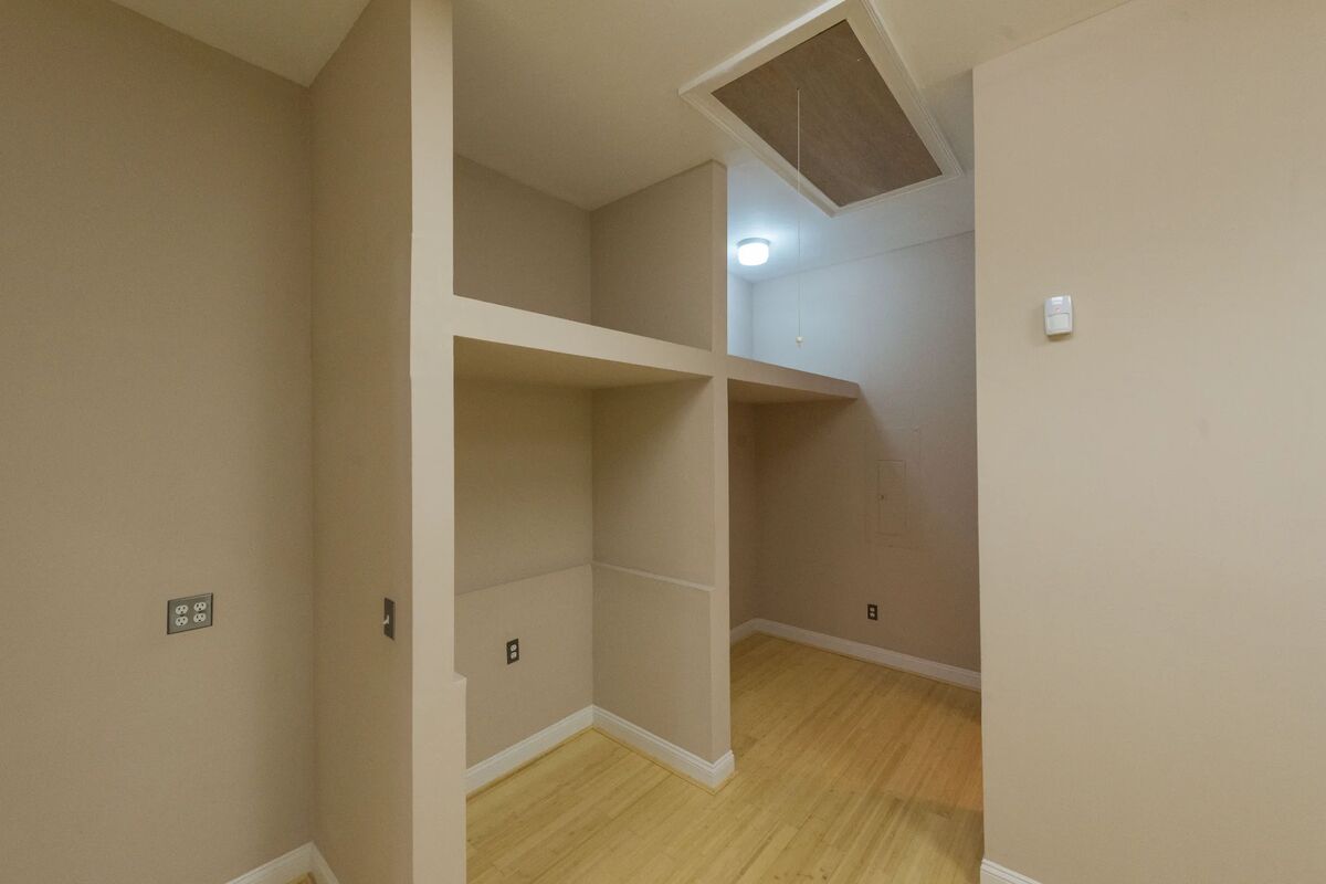 Hallway with hardwood floors