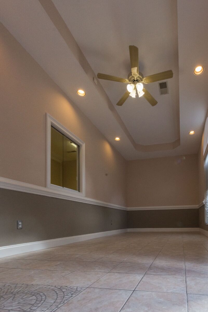 Spacious office with built-in shelving